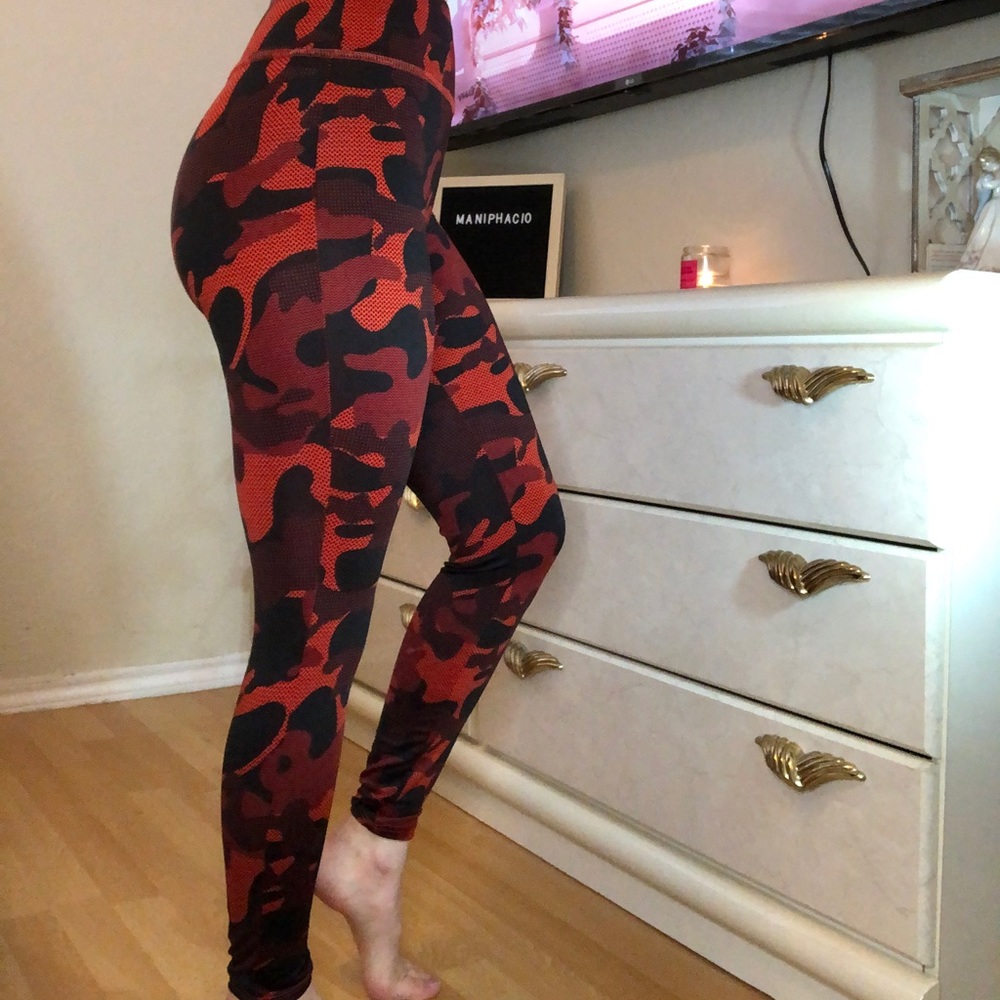Wild Fable high rise full length black and orange camouflage workout leggings.